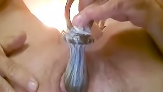Amateur gay is impaling his asshole with dildo