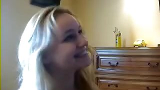 cute blonde girl sucks on the end of his long cock