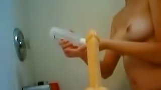 A hot girl smashes her snatch with a big yellow dildo