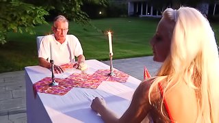Romantic dinner between a teen and an old man she lusts after