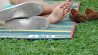 Candid asian soles in park