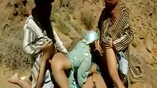 Three arabs fucks hot arabianslut in desert .